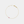Gold bracelet with a small pink and black bead on a light gray background