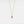 A gold-plated chain necklace with a solid 925 sterling silver pink evil eye charm pendant.