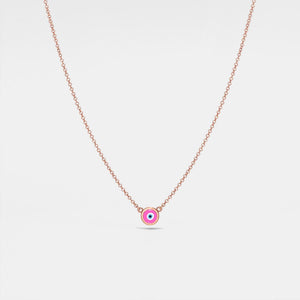 Necklace with a small round pendant on a light gray background