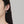 Earring worn by a person with a neutral background