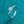 Silver ring with a diamond on a teal background