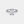 An engagement ring featuring an emerald-cut moissanite centerpiece with hypoallergenic platinum plating and small diamond accents around the band.