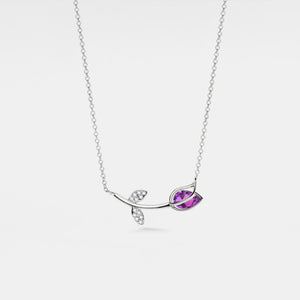 Necklace with a purple gemstone and silver butterfly pendant on a white background