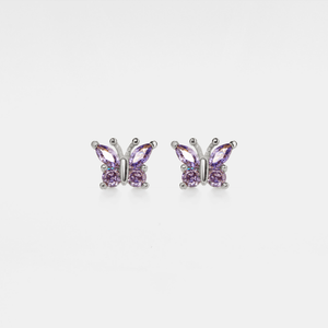 A pair of silver stud earrings in the shape of butterflies with purple cubic zirconia bodies.