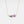 Gold necklace with a pink flower and green leaves pendant on a white background