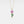 Gold necklace with a pink flower pendant on a white background