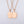 A collection of puzzle piece matching couple pendant necklaces in various colors including silver, gold, and rose gold.
