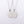 A collection of puzzle piece matching couple pendant necklaces in various colors including silver, gold, and rose gold.