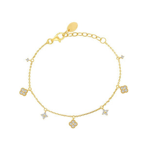 A gold-plated sterling silver bracelet with an adjustable chain and multiple colorful clover leaf charms.