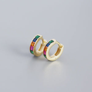 A pair of gold-plated huggie hoop earrings with multicolored gemstones