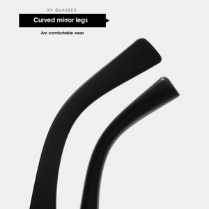 Black curved mirror legs on a light gray background