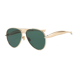 Gold-framed sunglasses with green lenses on a white background