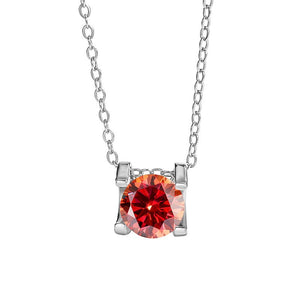 Necklace with a red gemstone pendant on a white background
