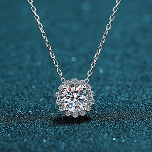 Diamond necklace on a dark blue textured background