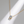 Gold necklace with a diamond pendant on a light gray background