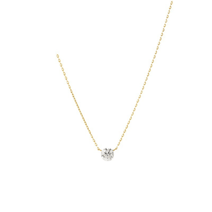 Gold necklace with a diamond pendant on a white background
