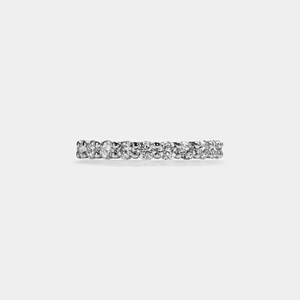 Diamond ring on a light gray background