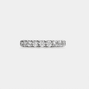 Diamond ring on a light gray background