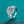 Silver ring with a large diamond on a teal background