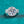 Diamond ring on a teal background
