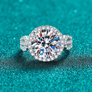 Diamond ring on a teal background