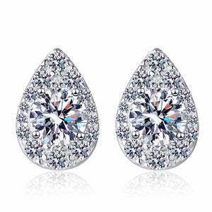 Teardrop-shaped earrings with clear gemstones on a white background
