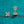 Gold earrings with star and moissanite designs on a teal background