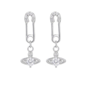 Silver earrings with diamond-like stones on a white background