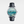 Watch with a black leather strap and Van Gogh painting on the dial against a white background
