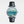 Watch with artistic dial featuring a seascape design on a white background