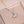 Two necklaces, one with a silver shell-shaped pendant and the other with a gold shell-shaped pendant, both with pearl details, displayed on a beige background.