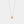 Rose gold necklace with a small pendant on a light gray background