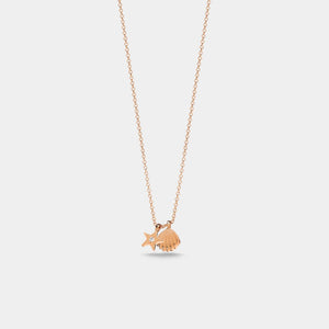 Rose gold necklace with a small pendant on a light gray background