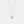 Silver necklace with a small pendant on a light gray background