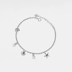 Silver bracelet with seashell, starfish and pearl charms on a light gray background