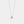 Silver necklace with a heart pendant on a light gray background