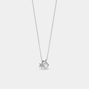 Silver necklace with a heart pendant on a light gray background