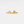 Gold ring with starfish and shell design on a light gray background