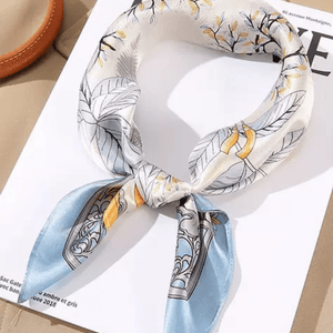 Decorative scarf with floral pattern on a magazine
