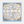 Square scarf with tree and leaf pattern on a light blue background