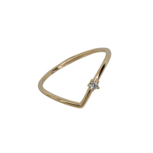 Gold ring with a diamond on a white background