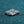 Diamond ring with a blue textured background