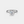 Silver ring with a large diamond on a light gray background