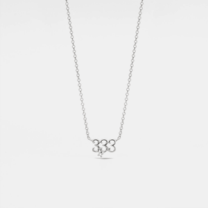 A gold-plated sterling silver necklace with the number '11' charm.