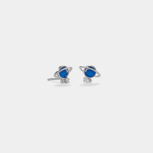 Pair of earrings with blue and silver design on a white background