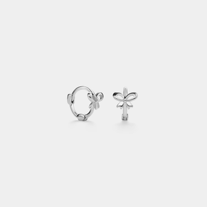 A pair of gold-colored bow knot hoop earrings made of sterling silver, displayed against a white background.