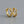 A set of small chain link huggie hoop earrings in silver and gold colors, displayed against a grey background.