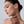 Close-up of a woman's face with a neutral background