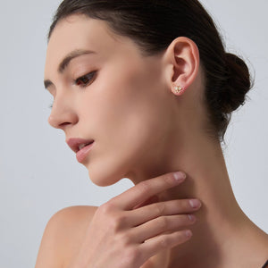 Close-up of a woman's face with a neutral background