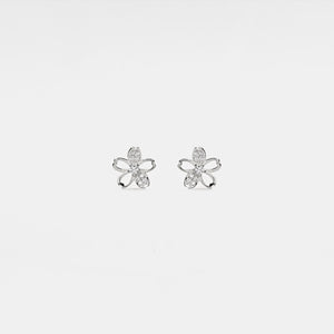 Butterfly-shaped earrings on a light gray background